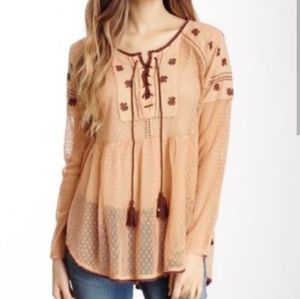 - Free People roses are red peasant tunic top.
